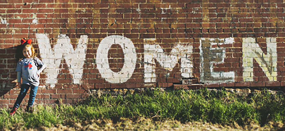 For women, girl standing at graffiti wall
